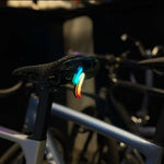 ECM New Road Bike Tail Light: Sleek "Lightning" Design, Rechargeable, Long Battery Life, Waterproof, and App-Controlled Color/Lighting Modes.